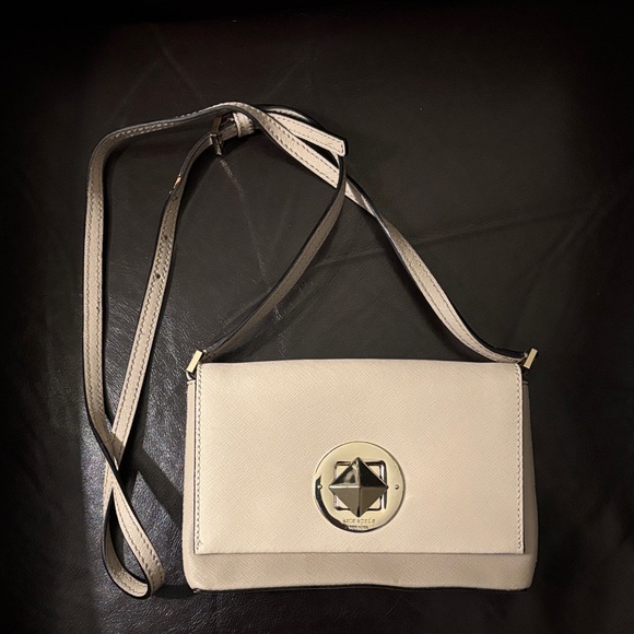 kate spade Handbags - Kate Spade Cream Crossbody Bag with Gold Accent
